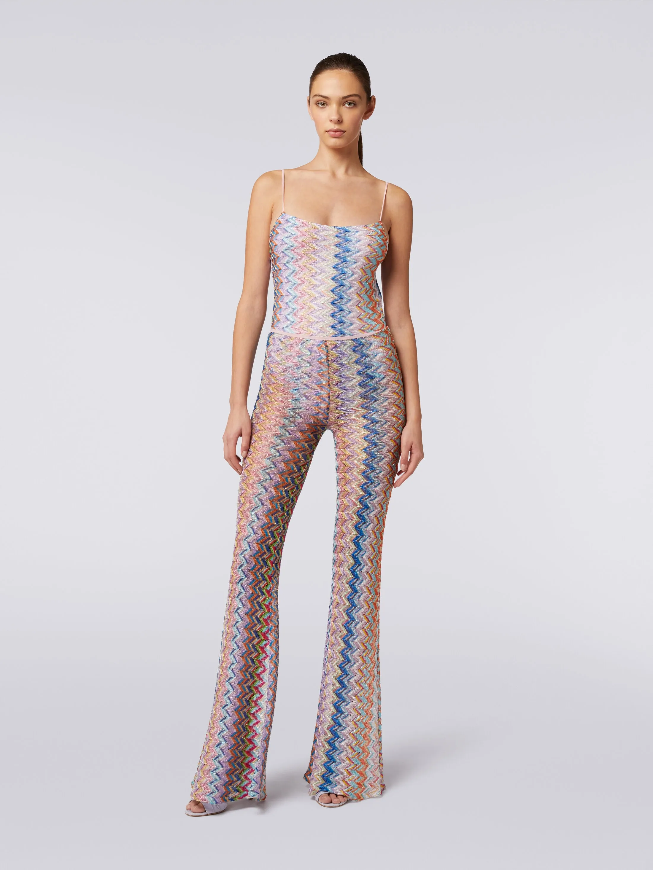 Pantaloni con fondo svasato e lurex
